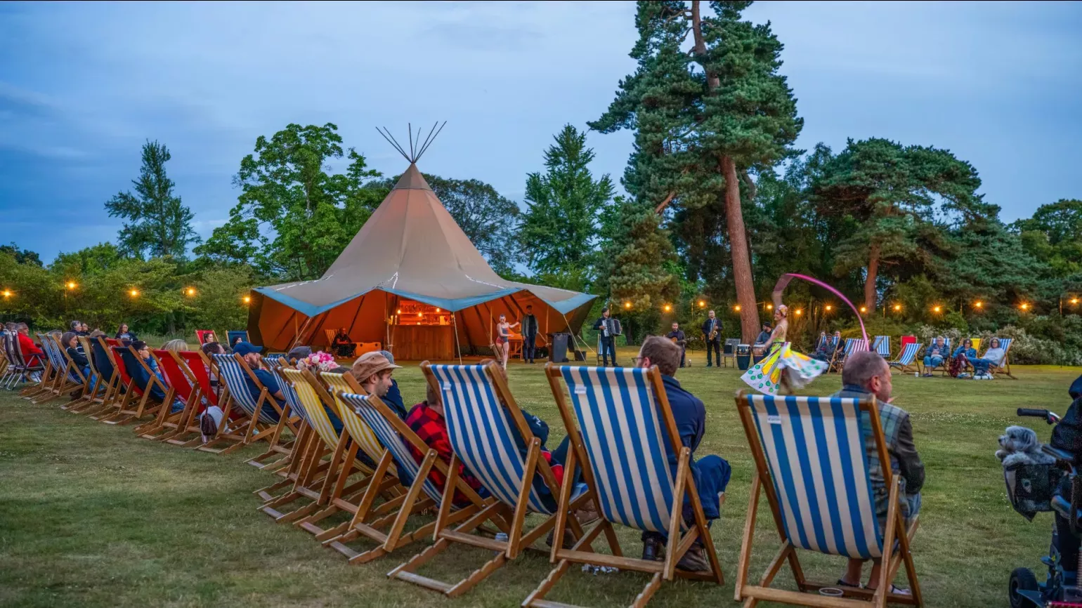 A collection of deckchairs at a festival