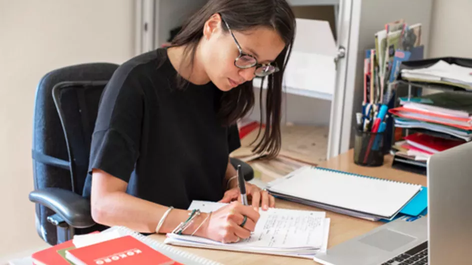 Staff member at desk