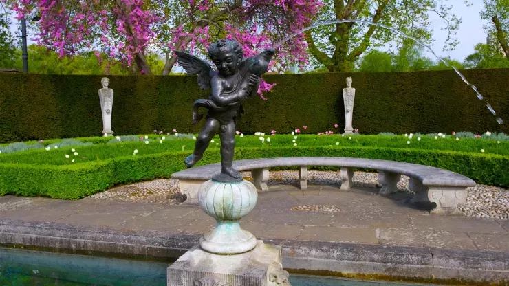 Cherub statue in the Queen's Garden at Kew 