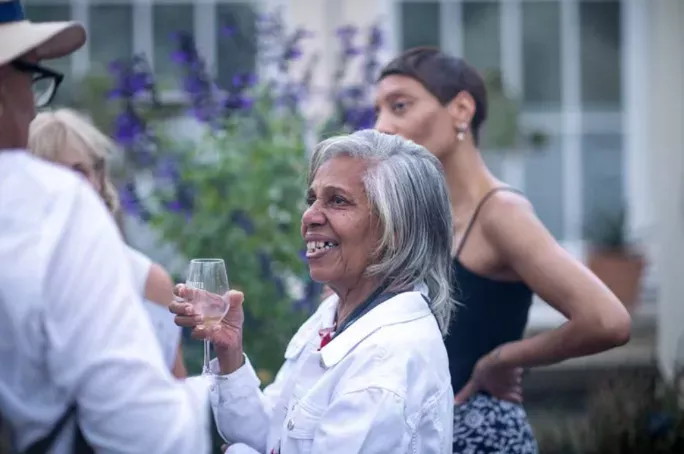 Woman holding wine glass