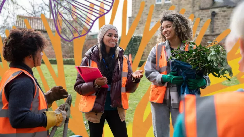 A group of young people stood in a garden wearing hi-vis vests, in the background there are colourful abstract shapes