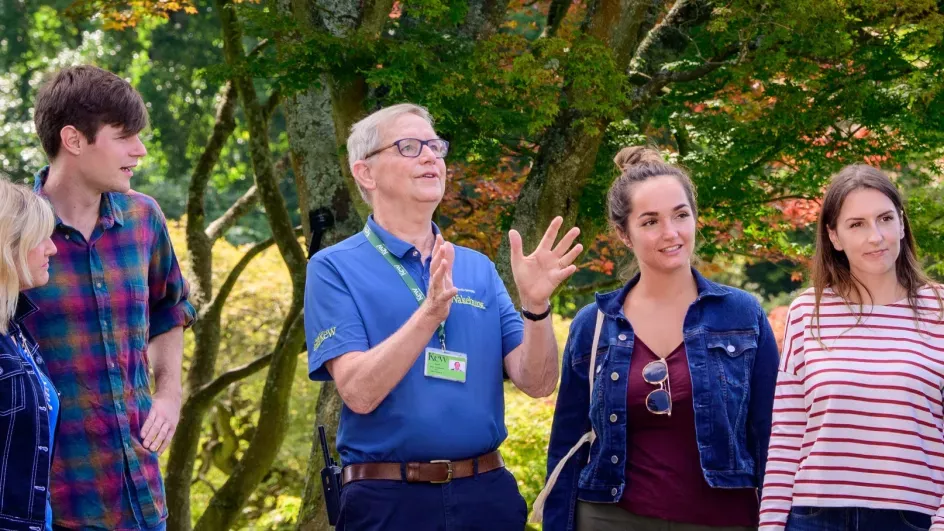 Members of the public enjoying a guided walking tour around Wakehurst