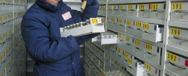 A scientist looks at a specimen in the Millennium Seed Bank